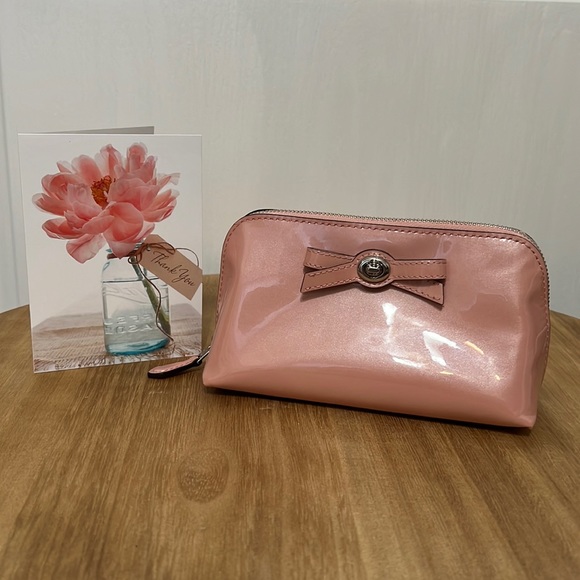 Coach Handbags - Coach pink cosmetic turnlock bag